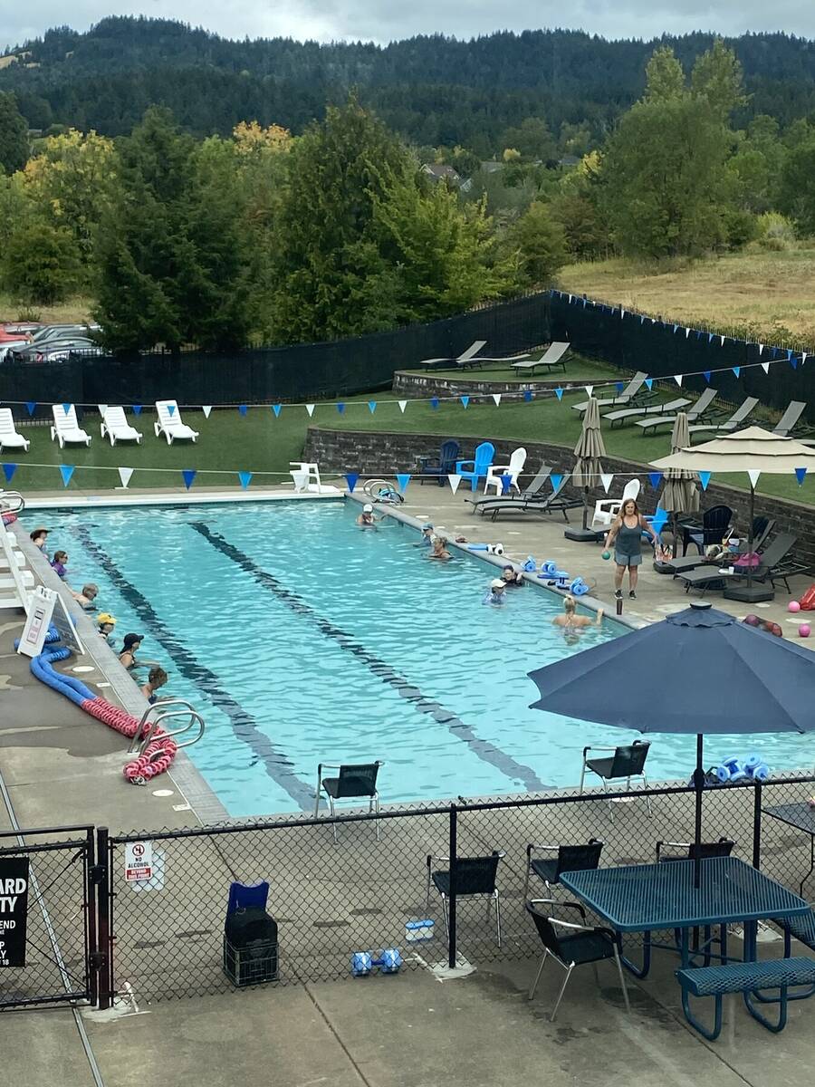 Families enjoying the pool at Timberhill Athletic Club